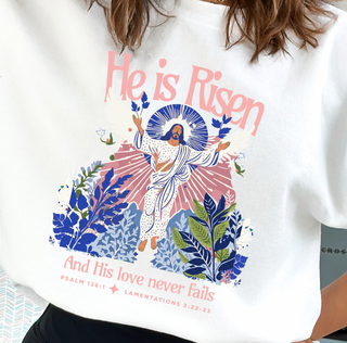 A woman wearing He is Risen And His Love Never Fails design